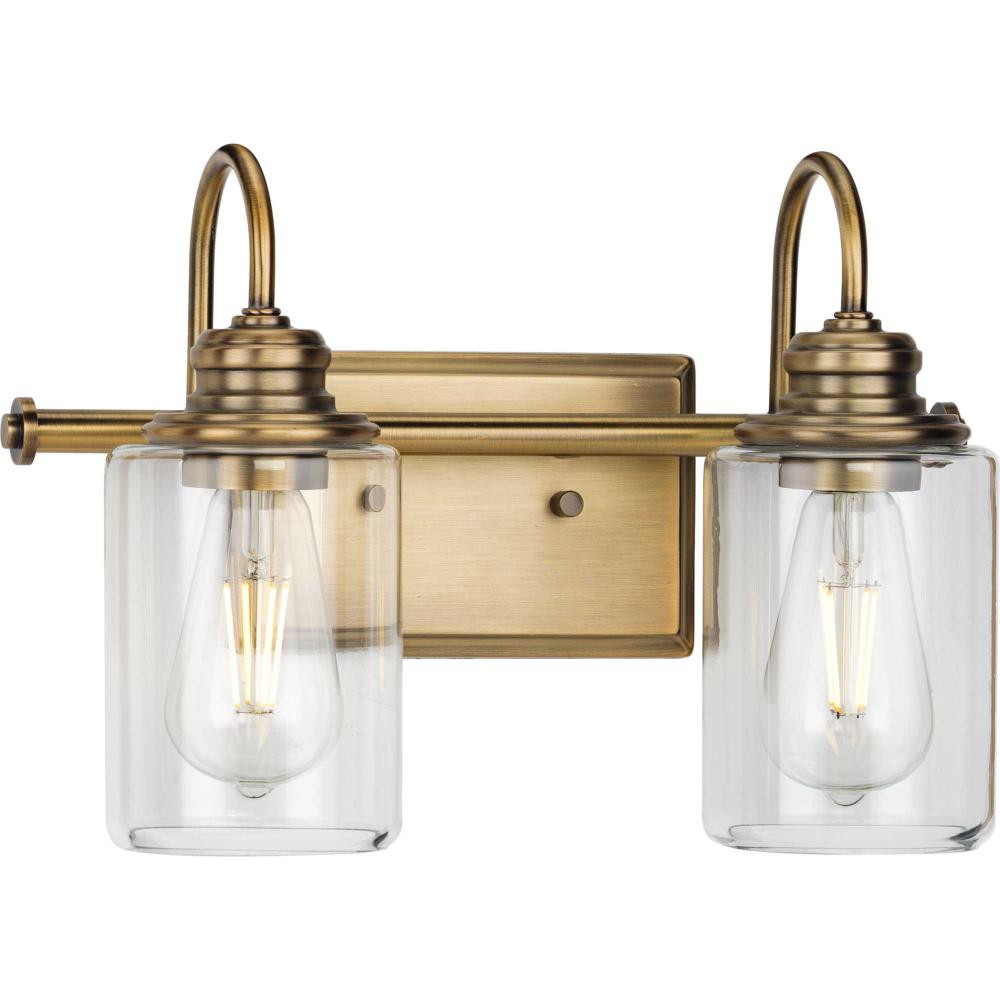 Aiken Collection Two-Light Vintage Style Brass Clear Glass Farmhouse Style Bath Vanity Wall Light