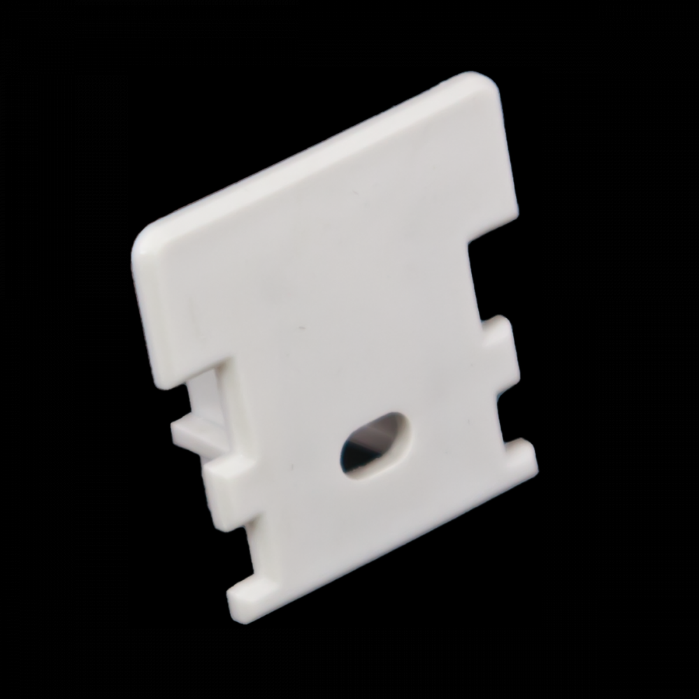 END CAP WITH WIRE FEED HOLE FOR PAVER EXT., WHITE PLASTIC